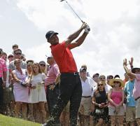 Tiger Woods puts on a brave face as he battles his demons at Sawgrass